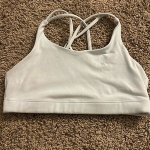 Athlete sports bra, size child large(12), color- light blue